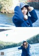 A woman in a blue coat and hat on a boat.