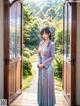 A woman in a blue dress standing in front of an open door.