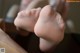 A close up of a person's feet in a pair of shoes.